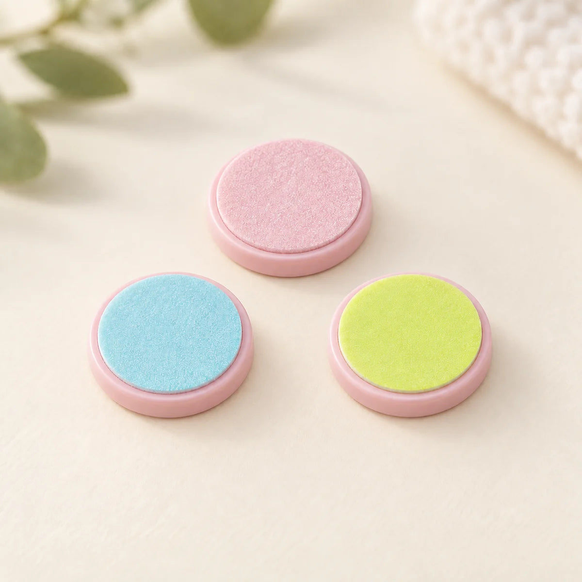 Three replacement filing heads with pink bases; file not included